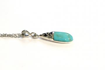 Pendentif triskell turquoise
